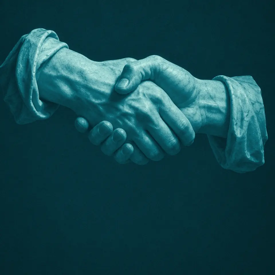 Duas mãos de mármore num aperto de mão